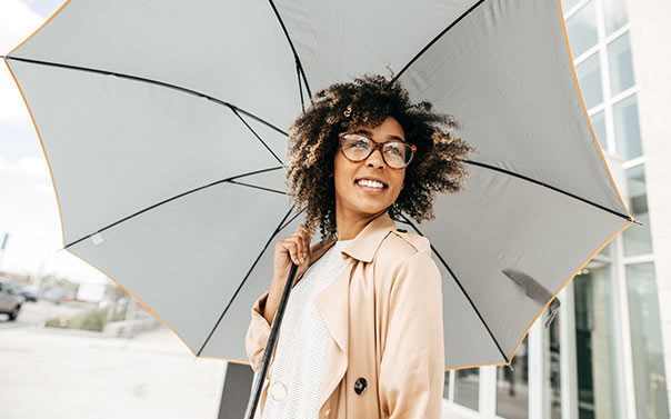 happy woman with umbrella